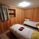 Bedroom in the apartment Desaymonet in Cogne